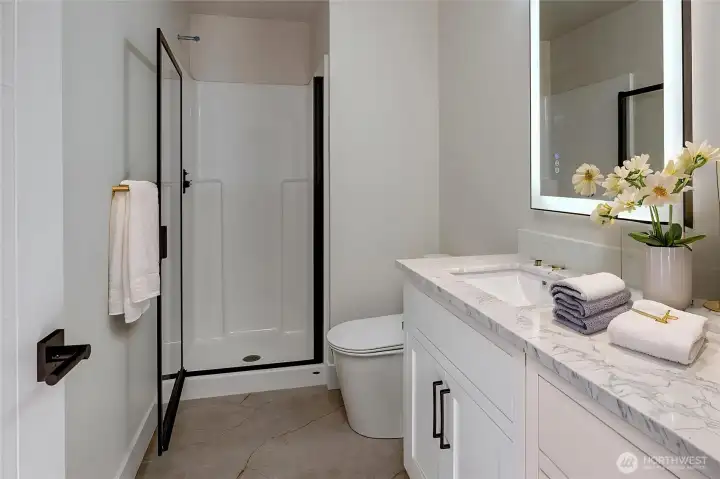 Jack n jill style ground floor bathroom. Virtually staged.