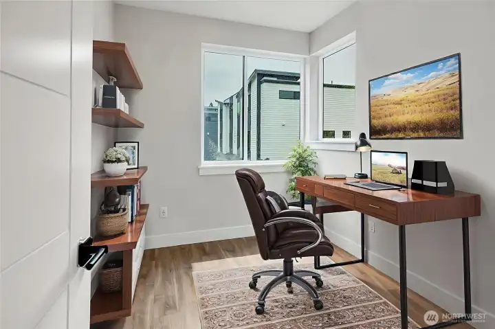 Light filled home office. Virtually staged.