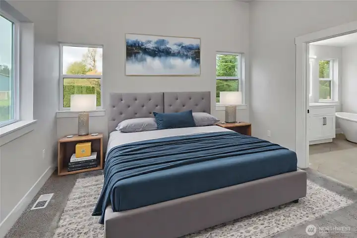 Primary bedroom with vaulted ceilings. Virtually staged.