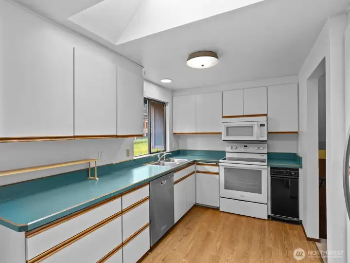 The kitchen offers a ton of storage space.