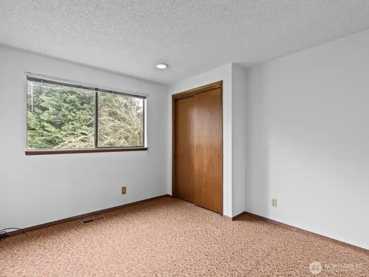 Across the hall is the 1st bedroom on this floor.