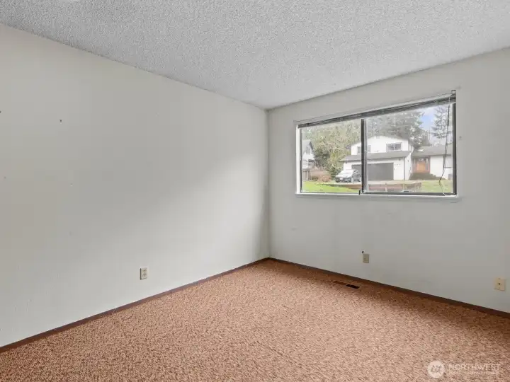 Next door is another bedroom.