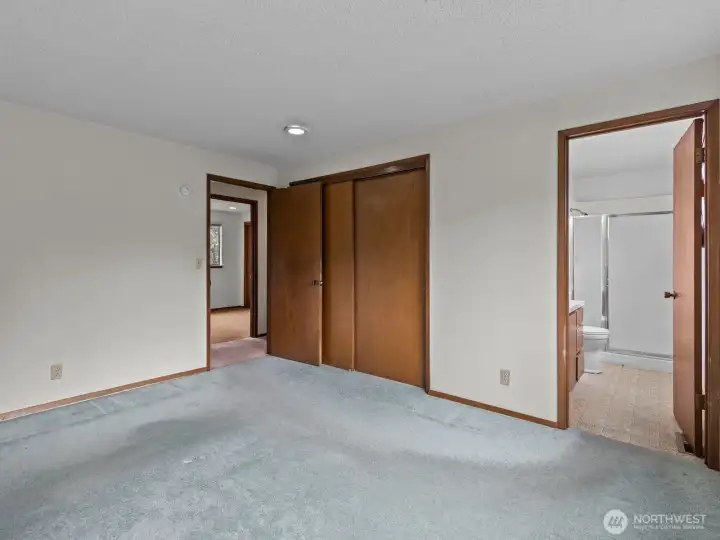 The primary bedroom is nice and roomy with plenty of space for all of your furniture.