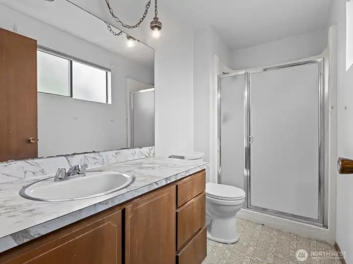 The ensuite 3/4 bath.