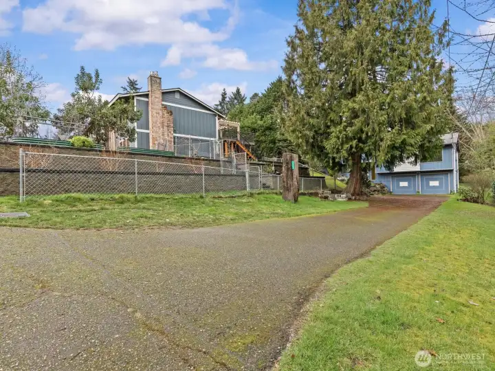 The long driveway with room on both sides is great for adding RV parking or space for your guests.