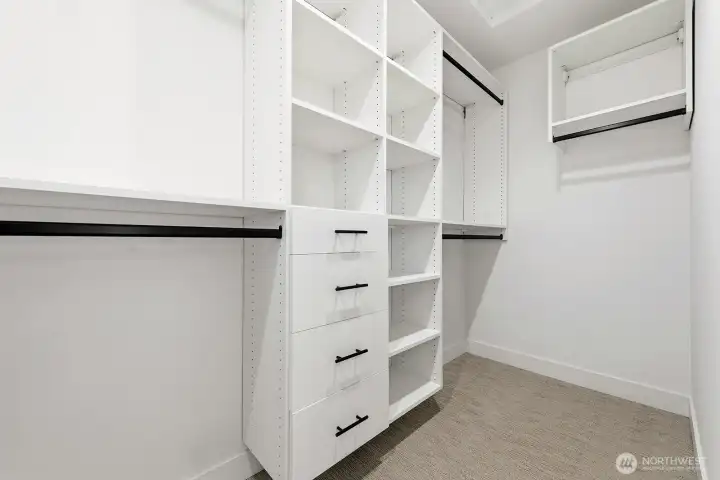 Primary walk-in closet.