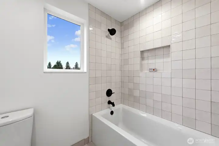 Showing the full shared bathroom.