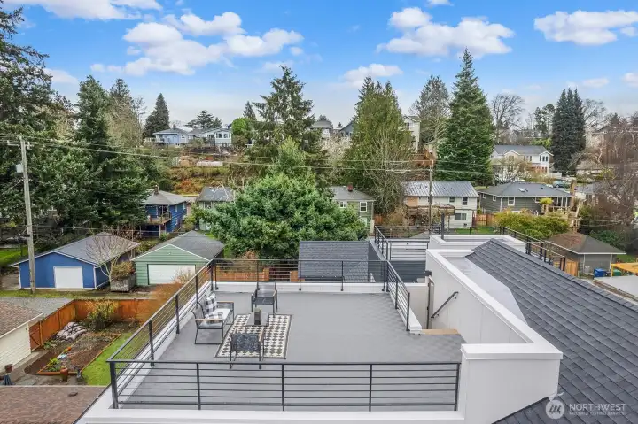 Spacious rooftop deck for summer fun.