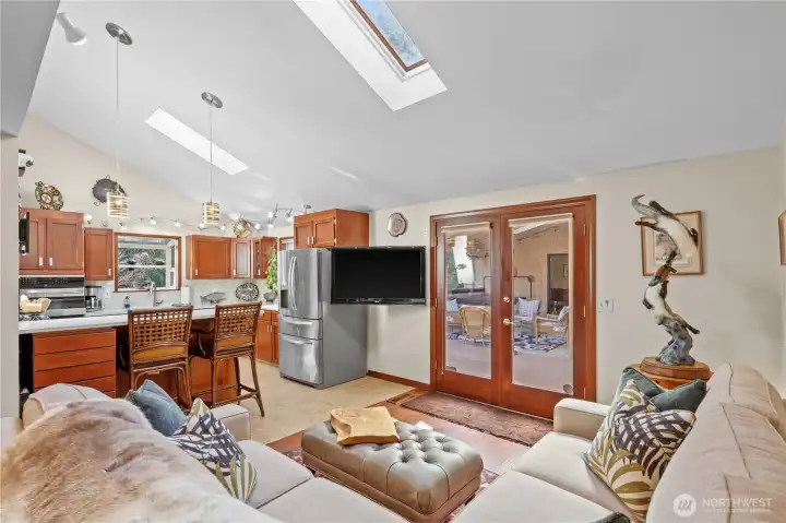 family room to kitchen & french doors to covered deck