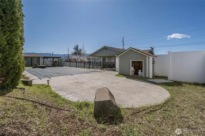Pool, pump house and shed at far S end of pool area