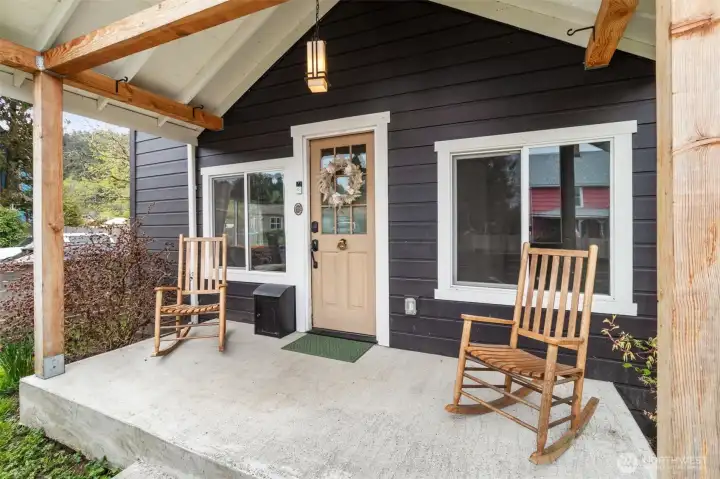 Welcoming front porch—perfect for morning coffee or unwinding in the evening.