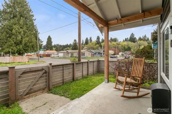 Welcoming gated entry offers both charm and an added layer of privacy.