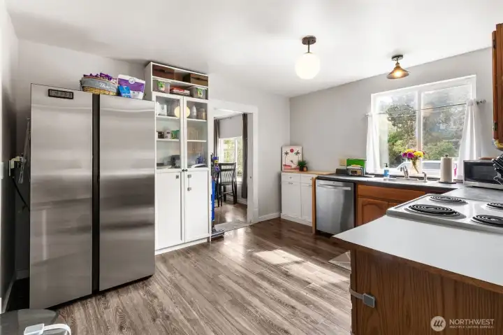 Well-designed layout offers efficiency for cooking your favorite meals. Easy care flooring throughout the home.