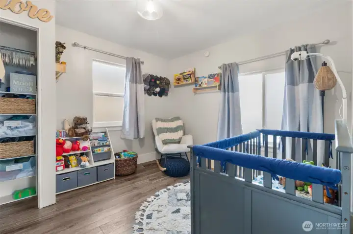 Additional bedroom offering versatility for guests, office or hobby workspace.