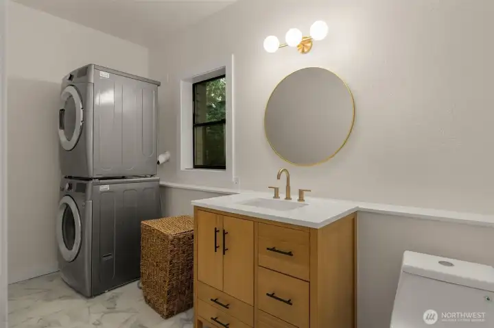 The Laundry room and 4th bathroom in the basement