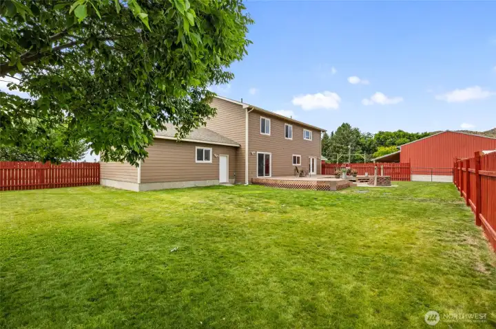 Fully Fenced Backyard with in-ground Sprinklers Fully Fenced Backyard with in-ground Sprinklers