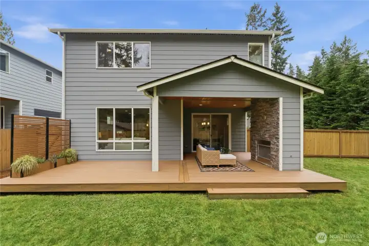 A warm, welcoming view of the home from the lawn, showcasing its inviting presence and well-kept exterior