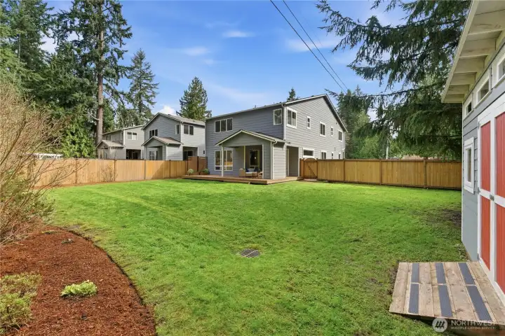 A corner view of the expansive garden, open and ready for whatever vision you bring to it