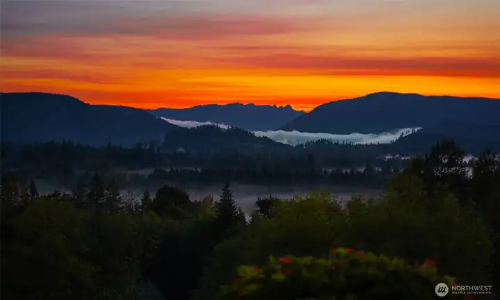 Sunrise view overlooking the valley and mountains