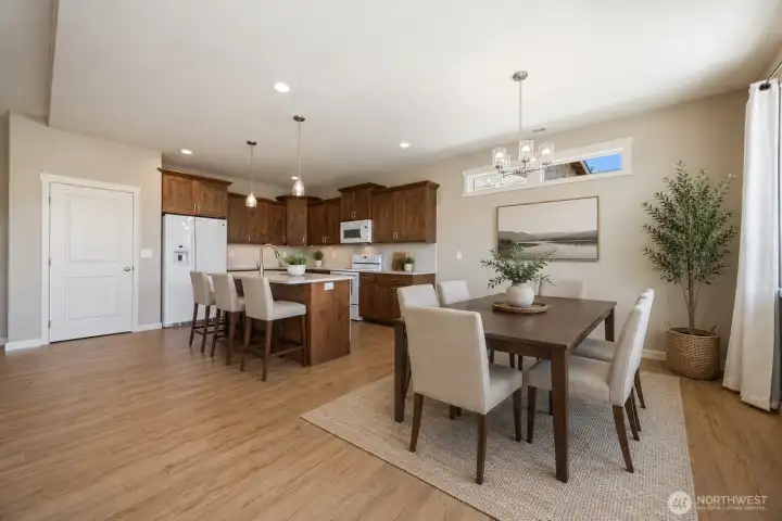 Well laid out kitchen and dining *Ai Enhanced Photo and virtually staged