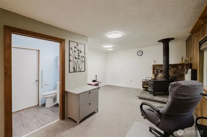 Family room with wood stove. Family room with wood stove.