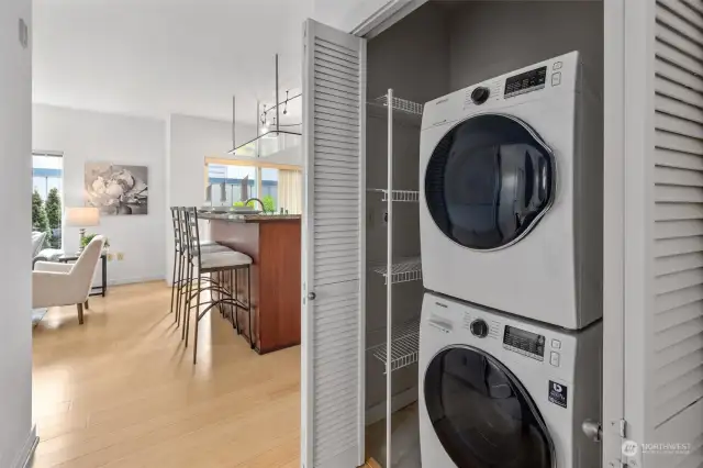 Full size stackable washer and dryer stay with the home.