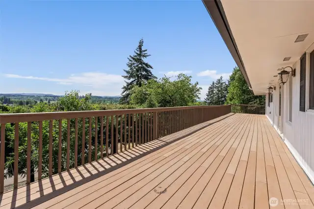 Expansive deck on the entire West side of the home is where you get to relax and watch great PNW sunsets!