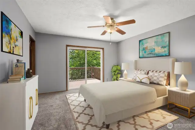Primary Bedroom with sliders to deck-- imagine a hot tub out there! Virtually Staged.