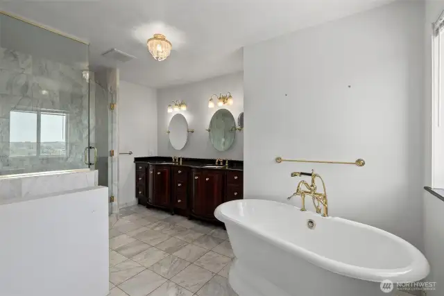 This bathroom is amazing! HEATED MARBLE FLOORS and a beautiful soaking tub!