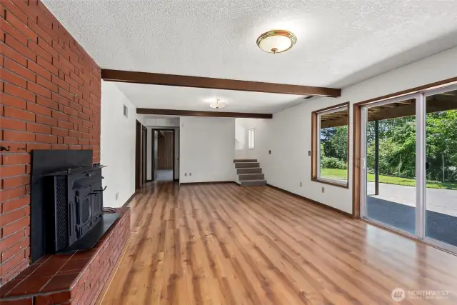 Downstairs Living/Recreation Room with fireplace & insert.