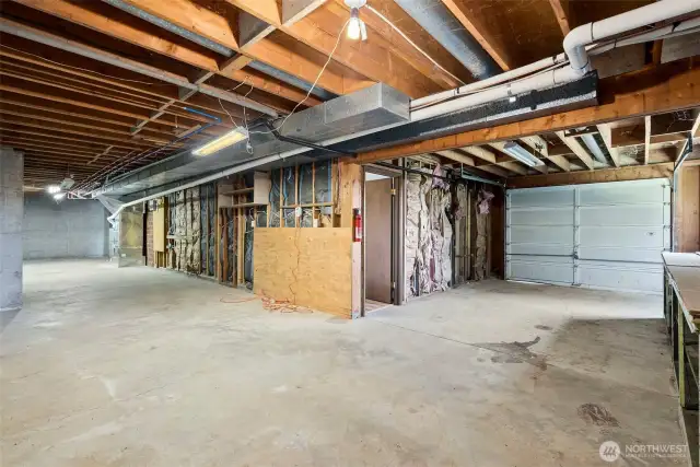 Downstairs Garage and unfinished storage/basement area.