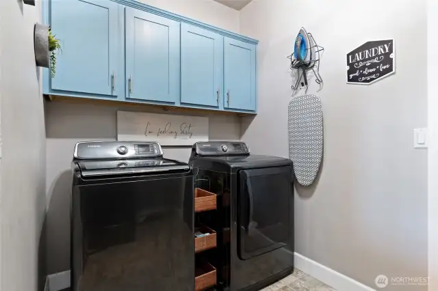 Upstairs Laundry! Nestled between primary bedroom hall and upstairs landing.