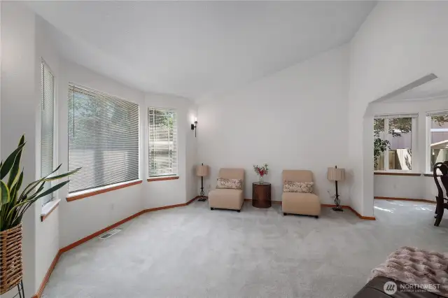 Spacious Living Room for entertaining guests (partially staged).