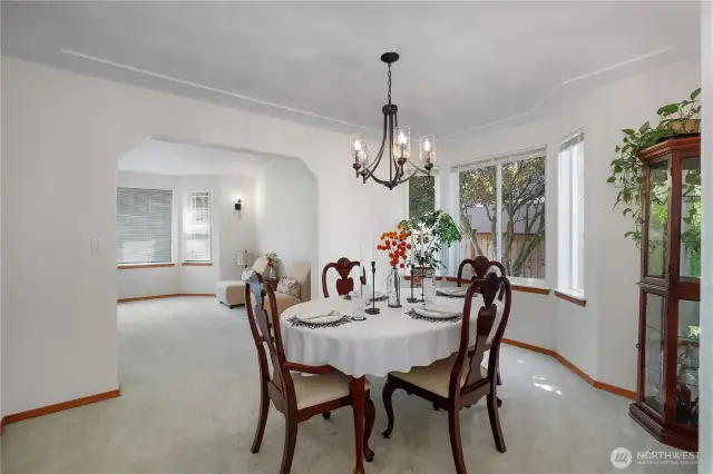Dining Room with lovely coffered ceiling - large enough for a bigger table if needed.
