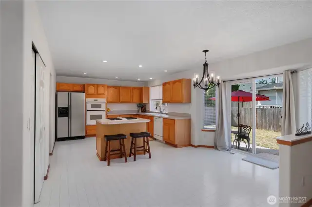 Lots of room for a Kitchen table and easy access to patio and backyard.
