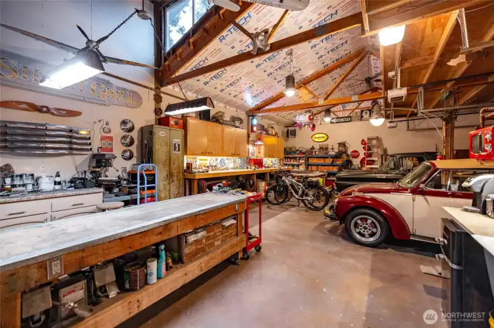 Heated 26 x 36 shop with 3 bays with deep sink, 3/4 bath & loft.
