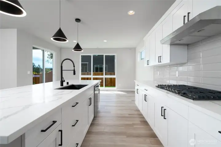 Photos are of a home in a different community and are for illustration purposes only to reflect typical finishes.  May depict seller enhancements.  Colors and options may vary.