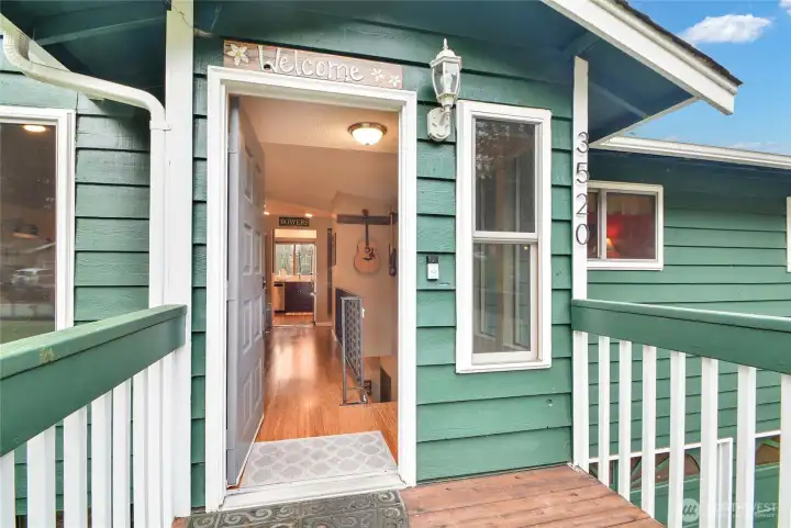 Enter into one level : living, dining, kitchen, 3 BR's, 2 BA's, deck