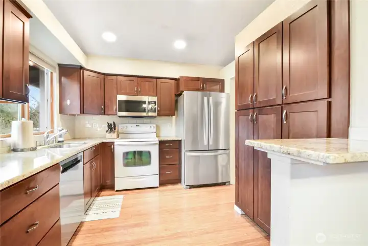 Beautiful maple cabinets, granite counters, pantry!