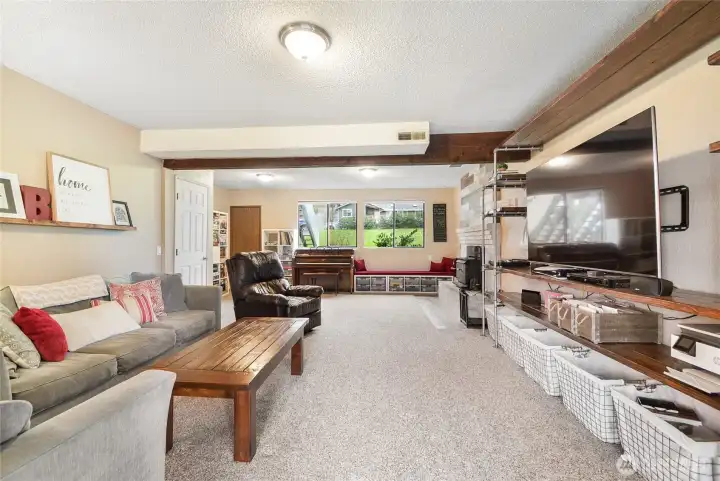 Also features slider to deck and just a few steps to fantastic backyard area!