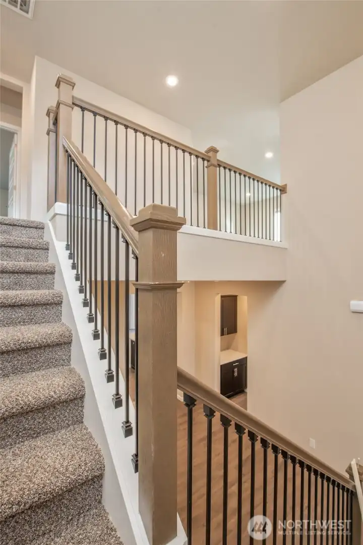 Large open staircase with new carpet