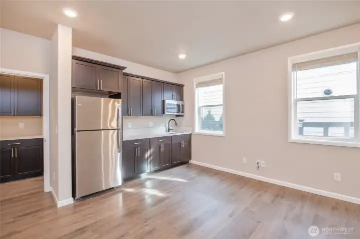 Interior entry to ADU. Great room concept in the ADU