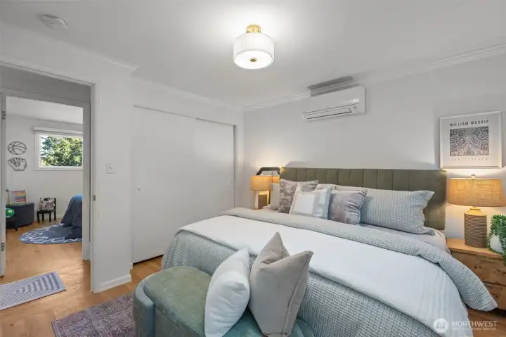 Generously sized primary bedroom easily fits a king-size bed