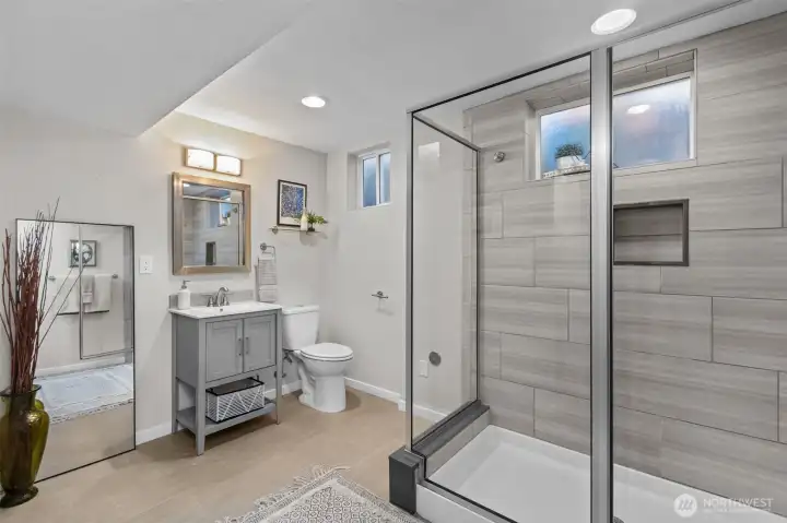 Oversized lower-level bathroom conveniently located next to the bonus room.