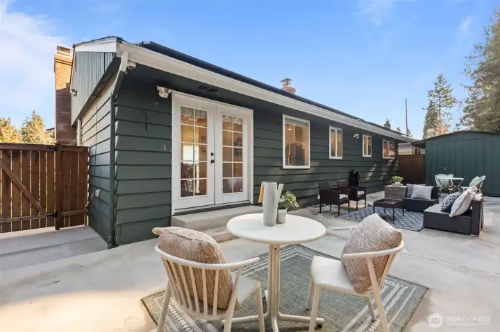 Large, flat patio just off the dining room extends the living space and creates the perfect setting for large gatherings.