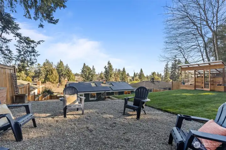 Versatile backyard offers plenty of creative spaces for entertaining, relaxing, and hosting.