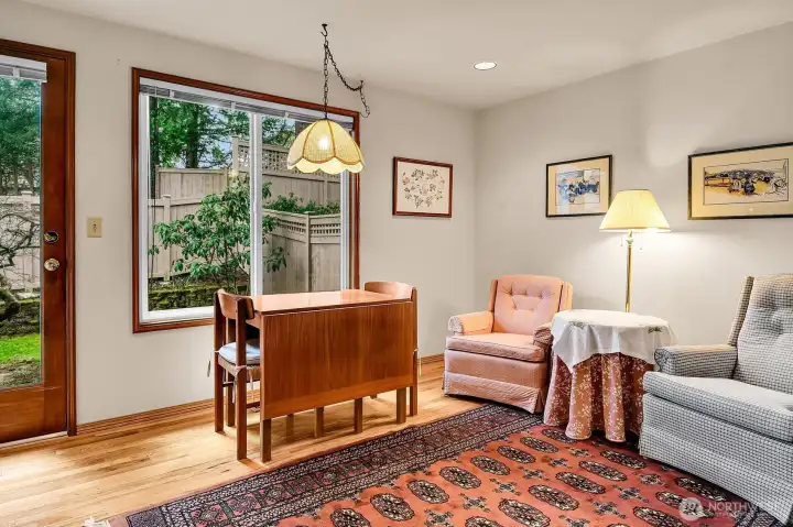 Charming family room off the kitchen views your yard, bringing the outside in. Makes a perfect tv room, library or morning room for informal meals.
