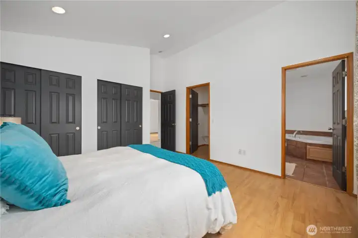 Primary bedroom with 2 additional closets