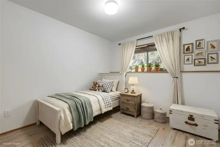 One of two guest bedrooms in the daylight basement, this room would be great for bunkbeds or perhaps a den.