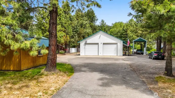 Driveway approach to home and shop/garage